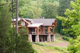 The use of antique log and lumber combined with mountainesque details are prevalent in many of our mountain home designs. Modern Mountain Timber Frame In North Carolina Colorado Timberframe