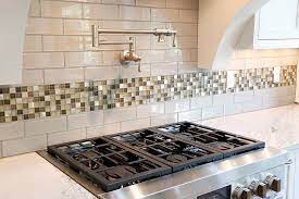 For a whole new kitchen, pick a bright, bold color. Accent Tiles For Kitchen Backsplash Nbizococho