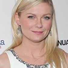 Vestido de sarga de seda Daisy blanco y amarillo de Rodarte con detalle de  volantes y cinturón con ojales usado por Kirsten Dunst en la proyección del  25 aniversario de Las vírgenes