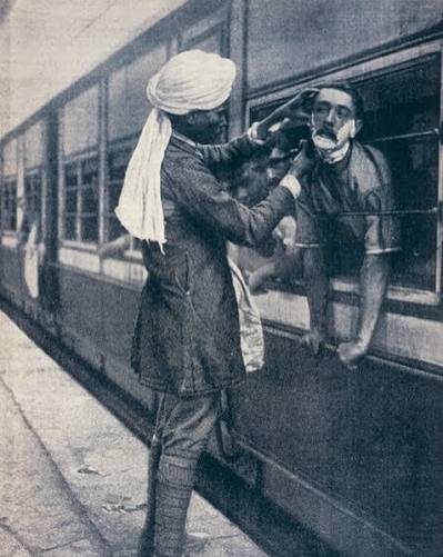 British army officer being shaved during a train stop to the Himalayas, from Journal des Voyages (1908). In an era when train journeys stretched for days, stops were brief but bustling with