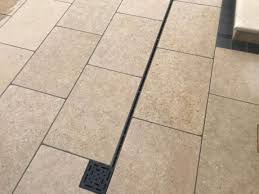 These drains are designed to catch the rainwater as it flows downhill, potentially causing a problem. Channel Drain And Brick Slot Drain For Water Drainage Natural Stone Yard Close To M50 Dublin Ireland