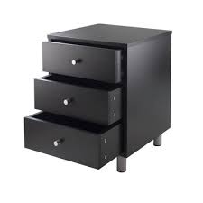 One good option is a small nightstand. Nightstand With Drawers Target