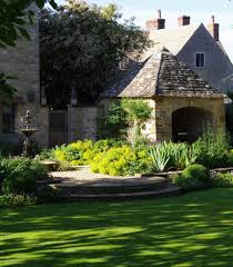 The Manor On The Green This Garden Began With The Removal And Infilling Of An Old Swimming Pool Close To Th Garden Design Garden Design Images Farmhouse Garden