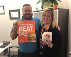 A student eats a delicious burger sitting in a fast food restaurant. Stuart Olson Inc On Twitter Burgerstobeatms Is Back Our Teams Are Showing Their Support With Some Delicious Burgers From Awcanada And You Can Too 2 From Every Teen Burger Sold Today Will