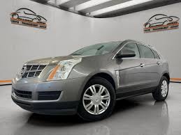 Image result for Mocha Steel 2011 Cadillac