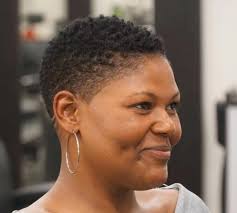 An impressive short black haircut with thick hair with surgical lines. Short Haircuts For Black Women 2020