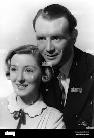 KAY WALSH as Queenie Gibbons and JOHN MILLS as Billy Mitchell in THIS HAPPY  BREED 1944