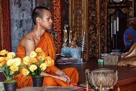 The day of ordination, the prospective monk and supporters enjoy a morning feast before the procession. Why Thai Men Ordain As Monks Before Getting Married