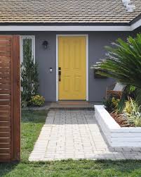 Yellow house exterior trend chart. Contemporary Gray Home Exterior With Yellow Door Hgtv