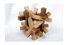 I thought, wouldn't it be cool to make a wooden one! so the wooden gordian knot was born. Dilemma Games Co Ltd Product