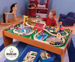 Passengers wave to the smiling townsfolk as they zip by. Kidkraft Ride Around Town Train Set With Table Walmart Canada