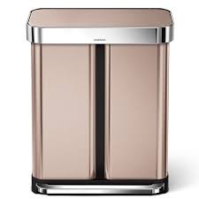 The dual compartment kitchen trash can saves space while letting you dispose of the waste conveniently. Our 4 Best Kitchen Trash Can Solutions For Fancy Budgets Small Spaces And In Between Epicurious