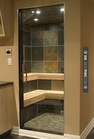 My parents live next door to a small red house. Steam Shower Sauna Basement Bathroom Design Small Basement Bathroom Bathroom Sink Decor