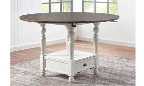 Our versatile shayne kitchen table features a smooth top with two leaves that expand its length. Joanna Farmhouse Round Counter Height Dining Table The Dump Luxe Furniture Outlet