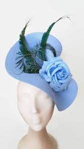 Spectacular Light Blue Fascinator The Pale Blue Hat Has Been Decorated With A Handmade Flower And Some Peacock Feather Derby Hats Blue Fascinator Wedding Hats