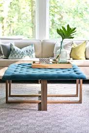 Find a hole in the bottom of your table and thread the needle through the hole to the top of the ottoman to grab a button. How To Build A Tufted Ottoman Coffee Table Ehow Diy Ottoman Coffee Table Tufted Ottoman Coffee Table Diy Ottoman