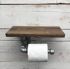4.2 out of 5 stars 1,018. Rustic Toilet Paper Holder Industrial Toilet Paper Holder Toilet Paper Holder Black Iron Pipe Wood Wall Hanging Tp Holder Industrial Decor Bathroom Decor Buy Online In United Arab Emirates At Desertcart Ae Productid