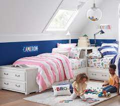 This boys bed features a bunk bed finished in navy blue paint, pairing up with the side table and shelving. Belden End Of Bed Kids Dresser Pottery Barn Kids