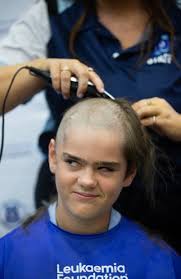 We can all be bald together': students shave heads…