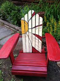Tricked Out My Adirondack Chair By Painting A Giant Daisy On It Adirondackchairs Adirondack Chairs Painted Beach Chairs Diy Wooden Adirondack Chairs