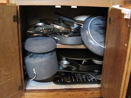 If you have a cabinet with 3 shelves, put: Napo Michigan Where Do The Pots Lids And Pans Go Three Tips To Organize Your Kitchen Cabinet