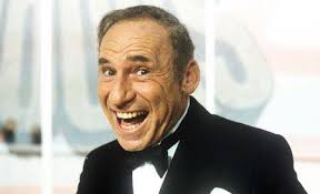 What is the tone of Brooks' movies?