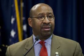 SEE IT: Philadelphia Mayor Michael Nutter jumps in to help security guard  in scuffle with homeless man