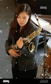 131202) -- FRANKFURT, Dec. 2, 2013 (Xinhua) -- South Korean Musician Jin  Pureum performs Saxphone at Juedisches Museum in Frankfurt, Germany on Dec.  1, 2013. Seven South Korean jazz musicians including Jin