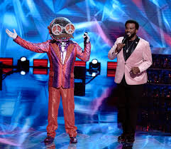 Guessing the identity of a celebrity dancer. Masked Dancer Is Masked Singer Spinoff That S All About Footwork