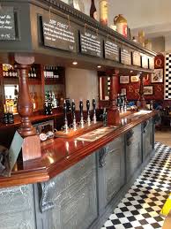 Quirky Pub Design Crackle Glaze Painted Bar Front The Chequers Old Town Stevenage By Tibbatts Abel Design Pub Interior Pub Design Paint Bar