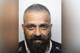 Watch as Derby people trafficker saunters through airport pretending not to  know an illegal immigrant