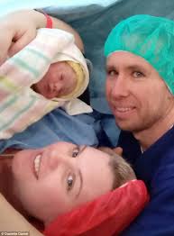 Danielle Daniel delivers her own baby during her own C-section