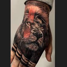 Awesome Lion Hand Tat Lion Head Tattoos Lion Hand Tattoo Hand Tattoos For Guys