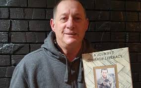 Man who learned to read and write in his late 50s becomes an author