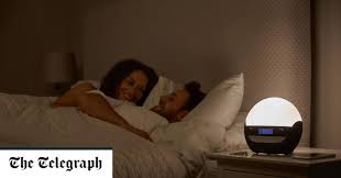The large lcd screen displays the current time, day of week, and there is not a back light, so you would not be able to see it in the dark. The 6 Best Wake Up Light Alarm Clocks To Help You Rise And Shine
