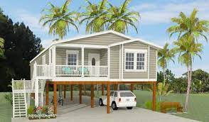 Our spectacular beach house plans are designed to help take in the best natural views and produce fantastic getaway properties in waterfront locations. Exterior Rendering Of Jacobsen Home Model Tnr 6481b Raised On Stilts Image Source Elevated Raised Piling House On Stilts Small Beach Houses Stilt House Plans