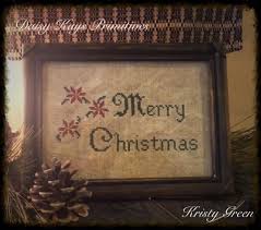 Christmas trees, snowflakes, robins and presents all in miniature embroidery form. Primitive Merry Christmas Primitive Christmas Sampler Primitive Christmas Decor Pr Cross Stitch Patterns Christmas Christmas Cross Stitch Christmas Cross