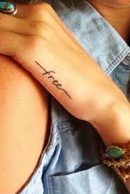 40 Charming One Word Tattoo Examples Typography Tattoo Tattoos Tattoo Designs For Girls