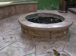 A stamped concrete patio consists of a large pad of poured cement stamped. Concrete Fire Pits In Decorative Concrete