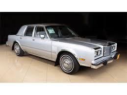 Image result for Radiant Silver 1985 Chrysler