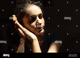 Dramatic attractive young lady hi-res stock photography and images