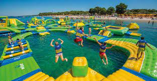 Splash Island Is A Floating Waterpark In Georgia That S Fun For The Whole Family Water Park Water Parks Near Me Island Water Park