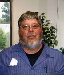 Timothy Shriver visits Board approves Benchmark Plan