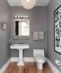 It is never a good idea painting a small bathroom a dark color. Looking To Update Your Bathroom On A Budget Rather Than A Costly Renovation There Are Some Simple Wa Small Bathroom Paint Bathroom Wall Colors Grey Bathrooms