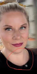 Lost silver heart necklace with name charms in Coligny Plaza area