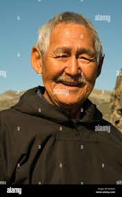 Eskimo man in traditional dress hi-res stock photography and images