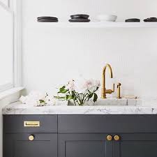 Black White Unlacquered Brass Simply Chic Henry In A Kitchen By Grantkgibson Water Dark Grey Kitchen Cabinets White Marble Countertops Kitchen Marble