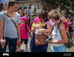 Paris, France, French Gay same sex parents, Lesbian Couple, Mums Marching  with Baby at Gay Pride March (LGBT) gay rights struggle, Parents LGBTQ+,  lgbt samesex Stock Photo - Alamy