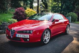 Image result for Rosso Chiaro Pin 1965 Alfa-Romeo