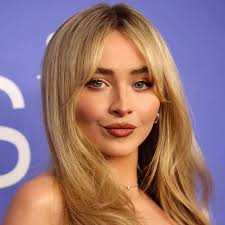 Lilie Reinhart or Natalia Dyer or Sadie Sink or Kendall Jenner or Sabrina  Carpenter or Rachel Zegler